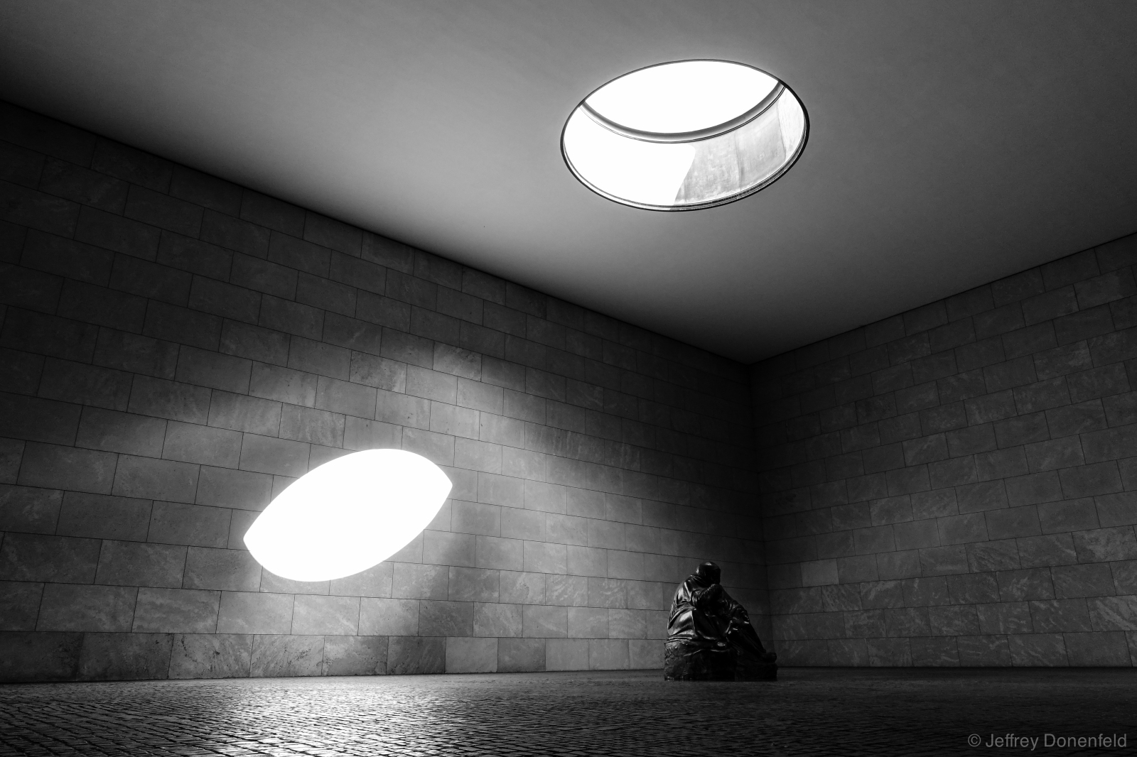 Neue Wache. From Wikipedia: "The Neue Wache (English: New Guardhouse) is a building in Berlin, the capital of Germany. It is located on the north side of the Unter den Linden boulevard in the central Mitte district. Dating from 1816, the Neue Wache was designed by the architect Karl Friedrich Schinkel and is a leading example of German Neoclassical architecture. Originally built as a guardhouse for the troops of the crown prince of Prussia, the building has been used as a war memorial since 1931."