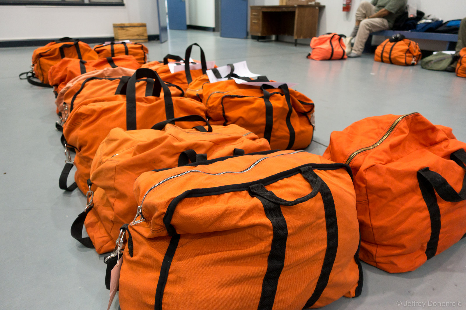 These orange bags are called "boomerang bags", and are used for gear storage, checkin bags, as well as carry on bags. In Antarctica they're used for just about everything, since everybody is issued at least two.