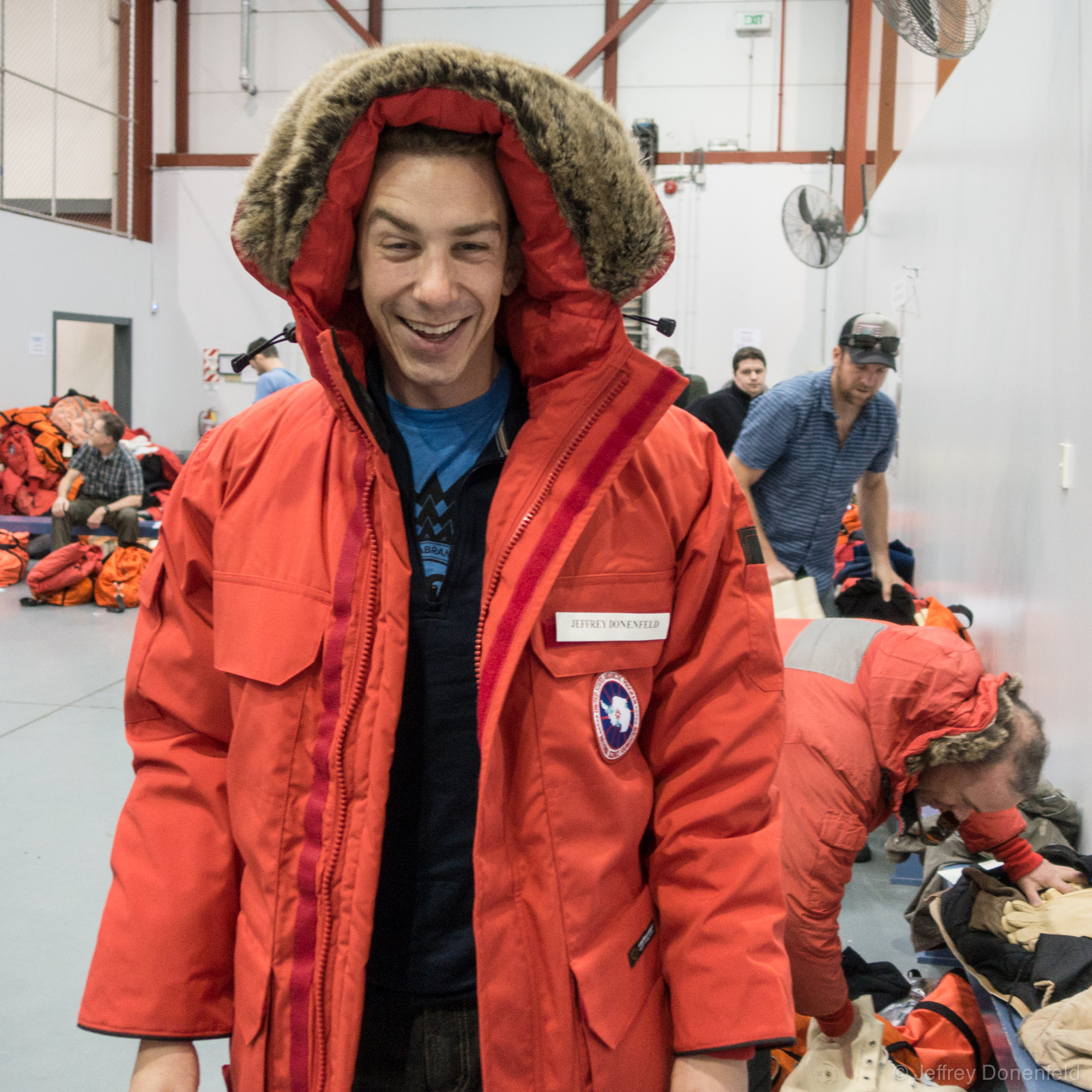 Me trying on my Canada Goose brand "Big Red" standard issue parka. Each parka has an official program patch, as well as a nametag.